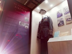 A RAF uniform with some information on display inside The Devil's Porridge Museum.