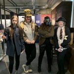 A group of students dressing up in The Devil's Porridge Museum.
