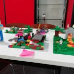 The winning three Minecraft inspired Lego builds on a table.