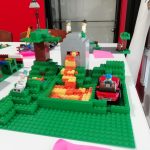 The 2nd place Lego build which features lava, a a tree and a car.