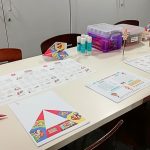 Some Nintendo themed crafts activities arranged on a table.